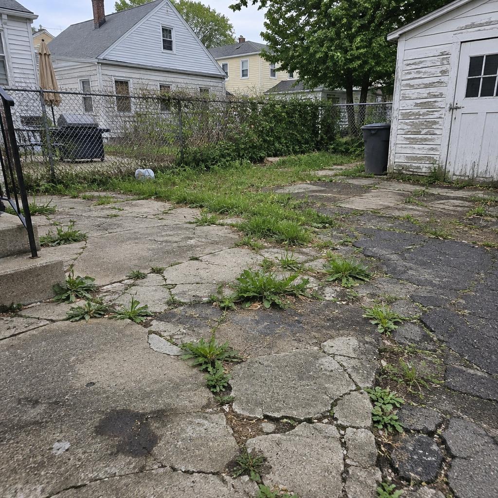 Backyard Paver Patio before work by Basra Construction in Long Island